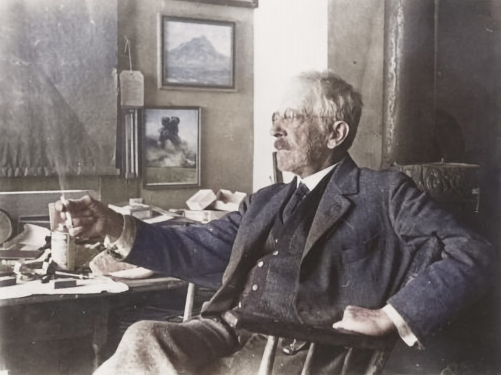 Charles Herbert Woodbury at his desk in 1935. (colorized)